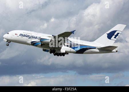 London Heathrow, United Kingdom - August 28, 2015: A Malaysia Airlines Airbus A380 with the registration 9M-MNE taking off from Stock Photo