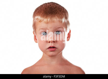 Little boy portrait grimace over white background Stock Photo