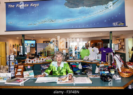 Key Largo Florida Keys,Visitor Center,centre,interior inside,help desk,information,senior seniors citizen citizens,woman female women,volunteer volunt Stock Photo