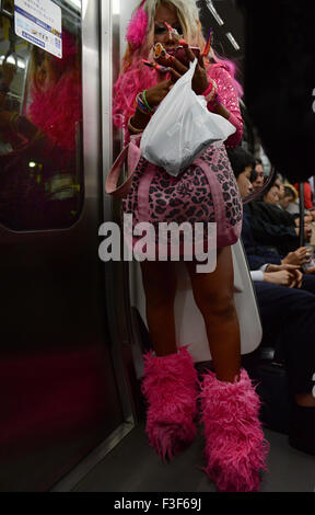 Miss Pink- A colorful Yamanba girl on the Yamanote train in Tokyo. Stock Photo