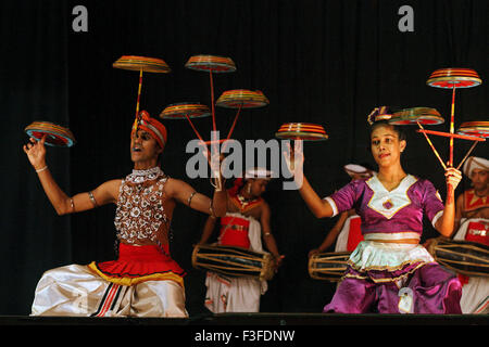 Raban dance comprises rhythmic dance patterns women beat single faces drum spinnin air balanced several drums ballad singing Stock Photo