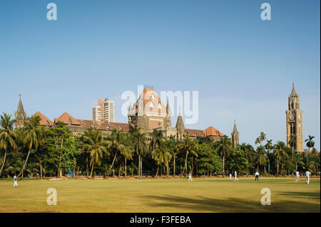 Heritage high court building ; Rajabai tower and Oval ground ; Bombay now Mumbai ; Maharashtra ; India Stock Photo