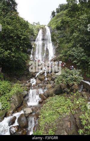 Popular waterfall of Amboli Ghat tourist bathing ; Sawantwadi to Amboli Hill station ; Maharashtra ; India Stock Photo