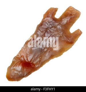 Early Bronze age flint arrowhead (Saharan Africa, c3000BC) 36mm long - 'Barbed and Tanged' style Stock Photo