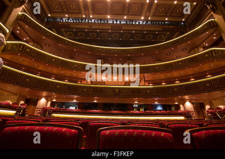 Auditorium and plush seating in the Omani Royal Opera House in Shati Al-Qurm, Muscat, Oman Stock Photo