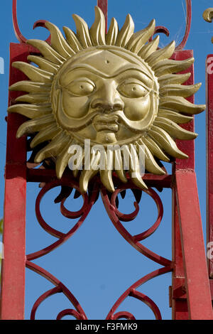 Sun statue on door of City palace museum ; Udaipur ; Rajasthan ; India Stock Photo