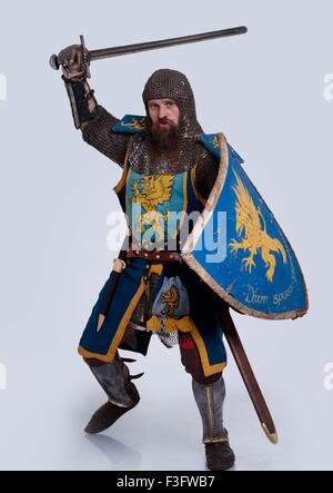 Medieval knight in attack position. Stock Photo