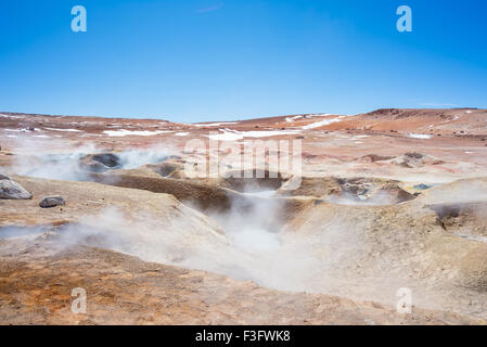 Steaming hot water ponds and mud pots in geothermal region of the Andean Highlands of Bolivia. Roadtrip to the famous Uyuni Salt Stock Photo