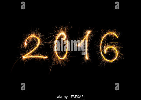 Happy new year. Digits 2016 made from fireworks isolated on black background. Stock Photo