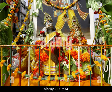 Lord Krishna birthday celebration carnival scene depicting lord Krishna with Radha idols in truck Jabalpur Stock Photo