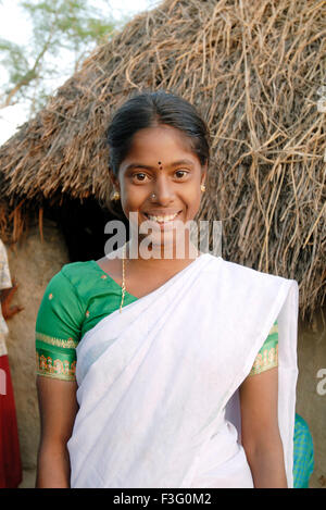 Tamil woman smiling wearing traditional jewelry.Goa,India Stock Photo ...