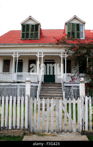 old house picket fence gate, Belize city, Belize, Central America Stock Photo