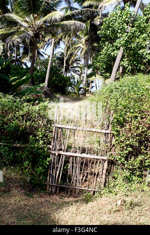 Wooden picket fence door, Village Bhogwe ; Konkan ; District Sindhudurga ; Maharashtra ; India , Asia Stock Photo