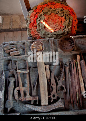 A cobbler's tools in the Folklore Museum of Sinarades, Corfu Stock Photo