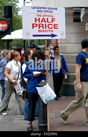 Man carrying placard, Piccadilly Circus, Piccadilly, City of Westminster, London, England, United Kingdom, UK Stock Photo