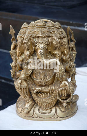Lord Ganesh idol ; India ; Indian brass Ganesha statue Stock Photo