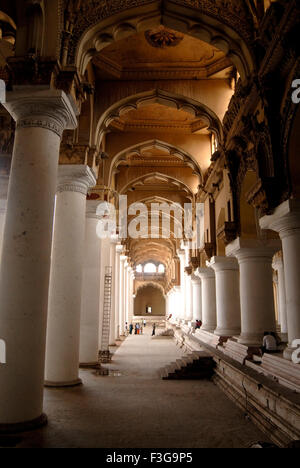 Row of grand columns and impressive arches of Thirumalai Nayak palace Indo Saracenic style Madurai ; Tamil Nadu Stock Photo