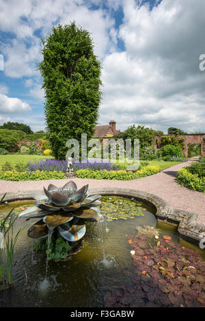 Waterlily water feature in the walled garden at Arley Hall in Cheshire. A sunny summer day. Stock Photo