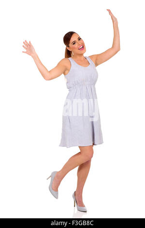Young woman dancing on white background Stock Photo - Alamy