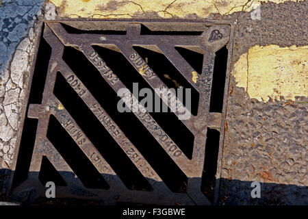 Drainage duct on road ; London ; U.K. United Kingdom England Stock Photo