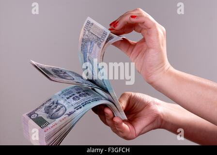 Indian paper currency one hundred rupee notes India MR#364 Stock Photo