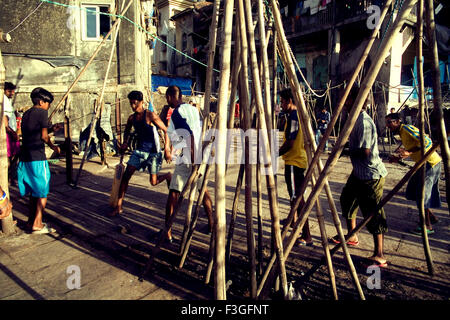 Teenage boys playing cricket ; Malabar hill ; Mambas Bombay ; Maharashtra ; India Stock Photo