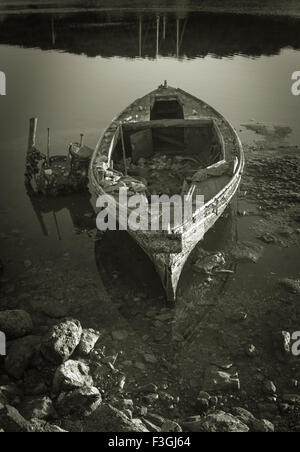 Old shipwrecked wooden fishing boats on the Isle of Mull Stock Photo ...