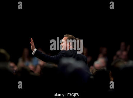 Manchester, UK. 7th October 2015. British Prime Minister David Cameron waves after his speech at Day 4 of the 2015 Conservative Party Conference in Manchester. Credit:  Russell Hart/Alamy Live News. Stock Photo