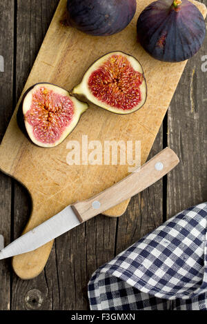 sliced fresh figs on cutting board Stock Photo