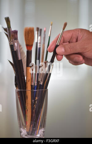 Paint brushes in the pot all kinds of brushes Stock Photo