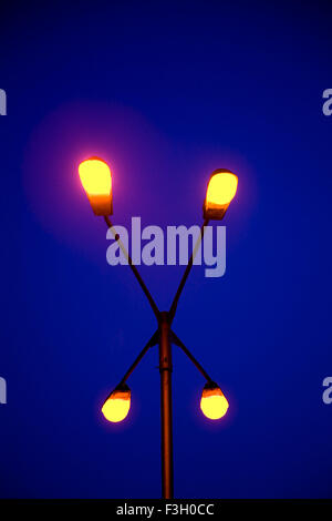 Light pole with four bulbs ; Mumbai Bombay ; Maharashtra ; India Stock Photo