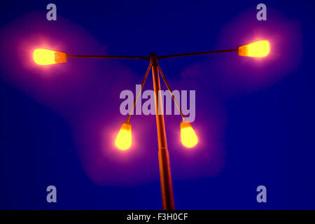 Light pole with four bulbs ; Mumbai Bombay ; Maharashtra ; India Stock Photo