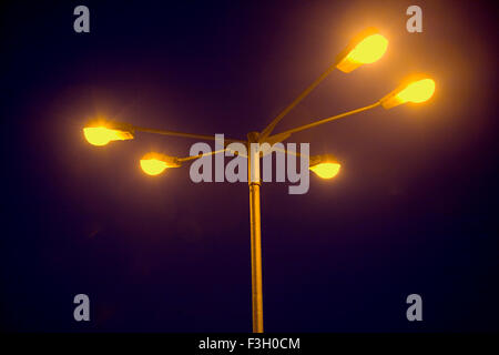 Light pole with four bulbs ; Mumbai Bombay ; Maharashtra ; India Stock Photo