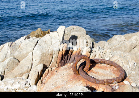 Rusty ring circle with a view on the sea Stock Photo