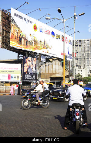 Mahalakshmi railway station & traffic on the road ; Bombay now Mumbai ; Maharashtra ; India Stock Photo