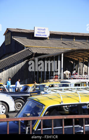 Mahalakshmi railway station & traffic on the road ; Bombay now Mumbai ; Maharashtra ; India Stock Photo