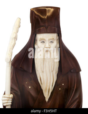 Chinaman old statuette on a white background isolated Stock Photo