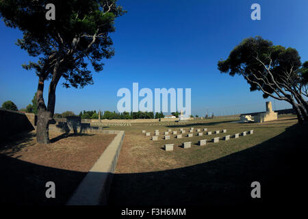 Wide angle view of East Mudros military cemetery. The Muhammadan - Indian army moslem memorial is on the front left side. Limnos Stock Photo
