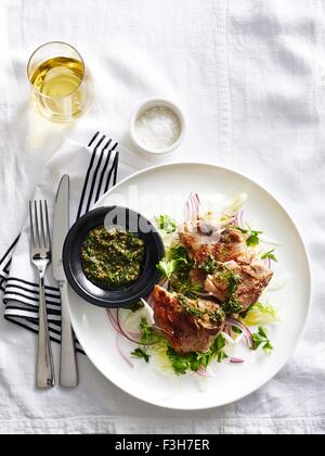 Lamb Chops with Salsa Verde, elevated view Stock Photo