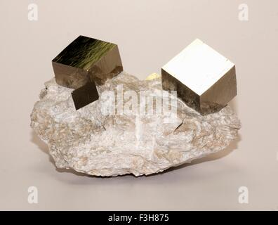 Iron pyrite cubic crystals in matrix, collected at Mina Victoria, Navajun La Rioja, Spain Stock Photo
