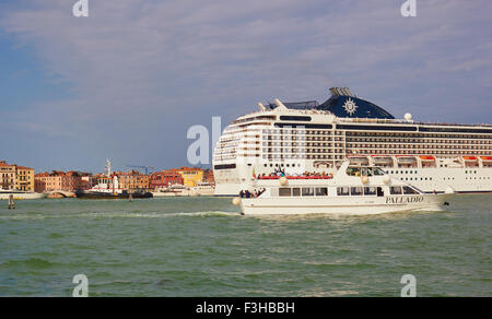 Cruise ship MSC Poesia weighing over 92,000 tons in Canal San Marco Venice Veneto Italy Europe Stock Photo