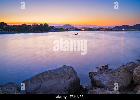 Sunset over the coast of Faliraki  Rhodes, Dodecanese Greece Europe Stock Photo
