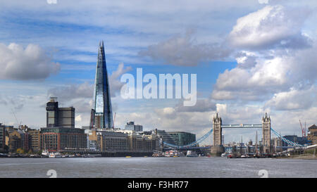 SHARD CITY THAMES SKY Cityscape of London Shard and Tower Bridge viewed from River Thames with Butlers Wharf and Shad Thames on South Bank London UK Stock Photo