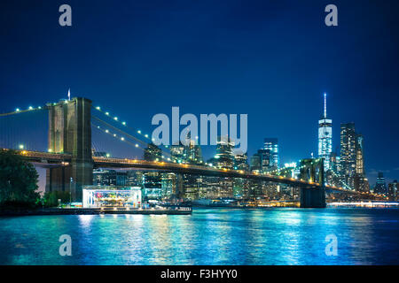 Beautiful night view of the Brooklyn Bridge looking towards Manhattan New York City Stock Photo