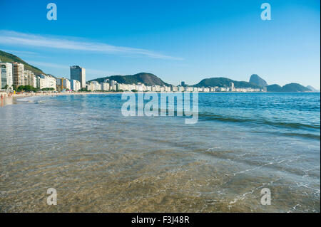 Tranquil sunrise view of Copacabana Beach on a clear clear morning in Rio de Janeiro Brazil Stock Photo