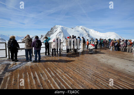 Tourist on a viewing platform, Aiguille du Midi, Mont Blanc Massif, Chamonix, French Alps, Haute Savoie, France, Europe Stock Photo