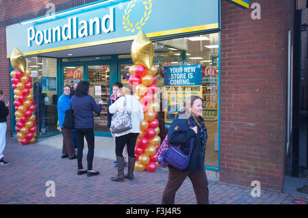 Tunbridge Wells, Kent, UK. 8th October, 2015. Shoppers queue for the opening of the new Poundland store in Tunbridge Wells, Kent, 8 October 2015. This is the first discount store in Tunbridge Wells. It was reported that some of the town's residents were 'devastated' and 'disgusted' by the opening. Poundland sells all its items for £1 and is the largest single-price retailer in the UK. Credit:  Robert Gray/Alamy Live News Stock Photo