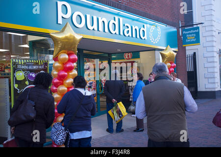 Tunbridge Wells, Kent, UK. 8th October, 2015. Shoppers queue for the opening of the new Poundland store in Tunbridge Wells, Kent, 8 October 2015. This is the first discount store in Tunbridge Wells. It was reported that some of the town's residents were 'devastated' and 'disgusted' by the opening. Poundland sells all its items for £1 and is the largest single-price retailer in the UK. Credit:  Robert Gray/Alamy Live News Stock Photo