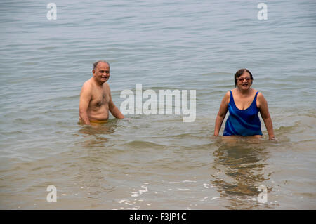 Senior couple enjoying sea at Devbaug beach Sindhudurgh Maharashtra India Stock Photo