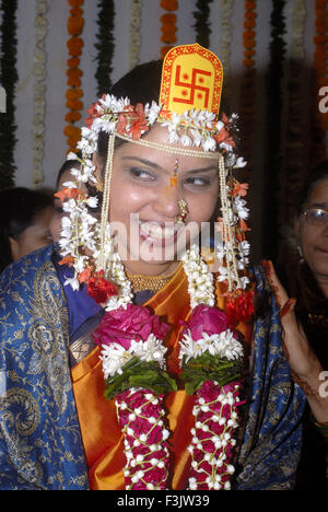 indian bride laughing wedding ceremony in Hindu religion at Borivali Mumbai Bombay Maharashtra India   Model Released Stock Photo